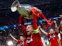 Liverpool captain Jordan Henderson lifts the Champions League trophy on June 1, 2019