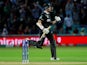 New Zealand's Mitchell Santner celebrates at the end of the match against Bangladesh on June 5, 2019