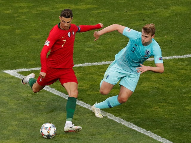 Portugal attacker Cristiano Ronaldo in action with Netherlands defender Matthijs de Ligt in the UEFA Nations League final on June 9, 2019