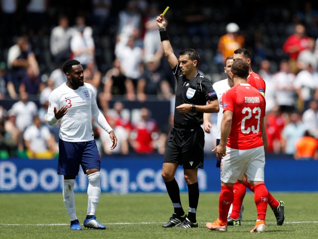 England's Danny Rose is booked during the UEFA Nations League third-place playoff against Switzerland on June 9, 2019.