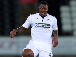 Swansea defender Tyler Reid completes Swindon move