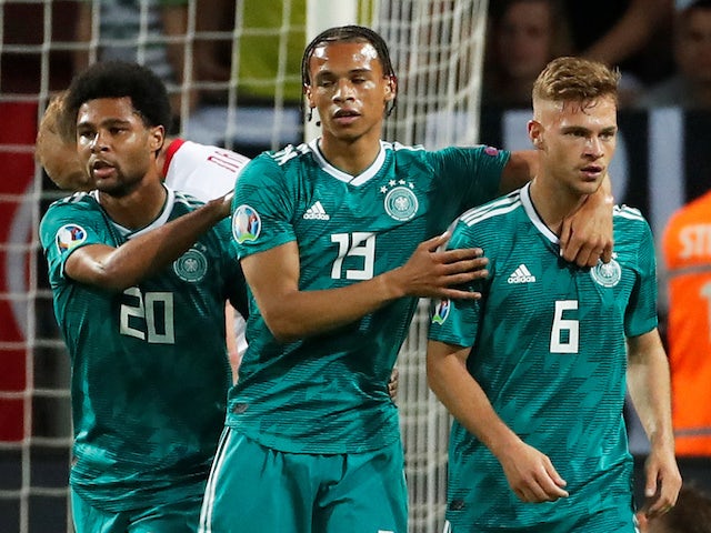Germany's Leroy Sane celebrates scoring their first goal with Serge Gnabry and Joshua Kimmich on June 8, 2019