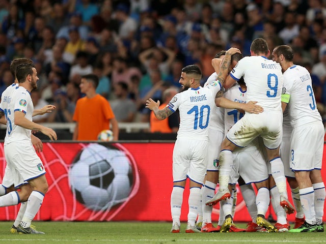 Italy's Leonardo Bonucci celebrates scoring their third goal with teammates against Greece on June 8, 2019