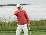 Justin Rose acknowledges the taller at the fourth green during the first round of the 2019 U.S. Open golf tournament at Pebble Beach Golf Links on June 13, 2019