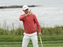 Justin Rose acknowledges the taller at the fourth green during the first round of the 2019 U.S. Open golf tournament at Pebble Beach Golf Links on June 13, 2019