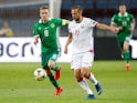 Northern Ireland's Steven Davis in action with Belarus' Igor Stasevich on June 11, 2019