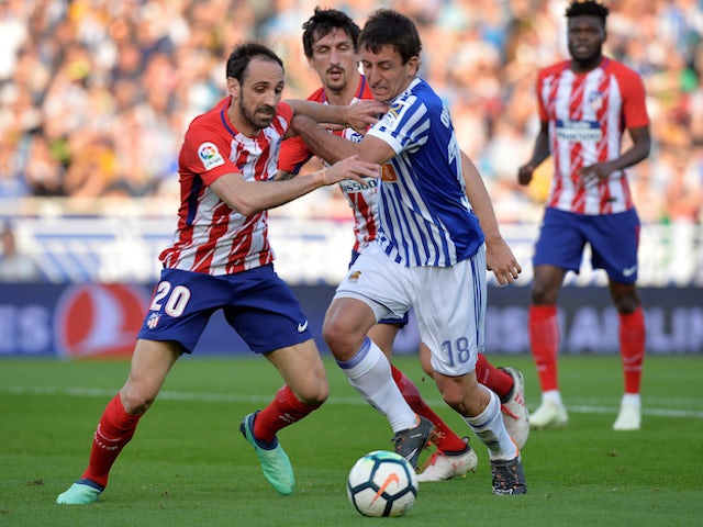 Real Sociedad attacker Mikel Oyarzabal in action against Atletico Madrid in April 2018