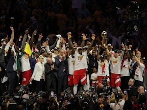 Toronto Raptors guard Kyle Lowry holds the Larry O'Brien Championship Trophy  during the NBA bas …