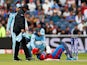 Afghanistan's Hashmatullah Shahidi is floored by a bouncer against England on June 18, 2019