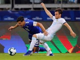 Argentina's Nicolas Tagliafico challenges Paraguay's Gustavo Gomez for the ball in the Copa America on June 19, 2019