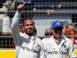 Mercedes' Lewis Hamilton celebrates pole after qualifying with second place Mercedes' Valtteri Bottas on June 22, 2019