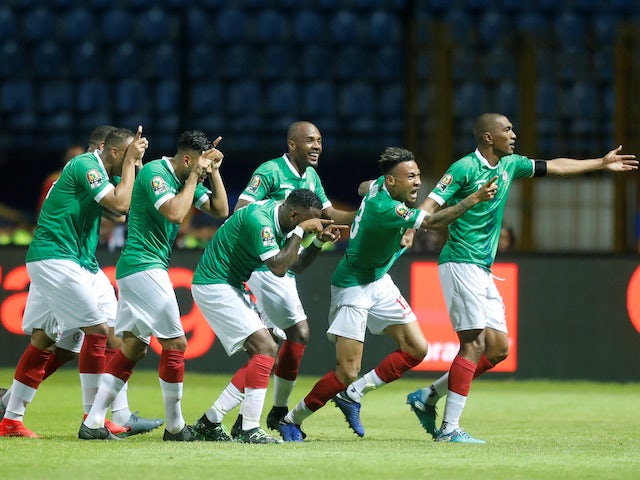 Madagascar's Anicet Abel celebrates their first goal with team mates on June 22, 2019
