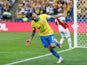 Dani Alves celebrates after putting Brazil four goals in front against Peru in their Copa America clash on June 22, 2019