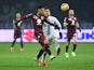 Torino defender Armando Izzo in action with Inter Milan striker Lautaro Martinez in Serie A on January 27, 2019