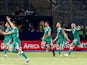 Algeria's Youcef Belaili celebrates scoring their first goal with Baghdad Bounedjah and teammates against Senegal on June 27, 2019