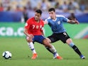 Chile's Alexis Sanchez in action with Uruguay's Giovanni Gonzalez at the Copa America on June 24, 2019