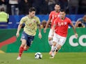 Colombia's James Rodriguez in action with Chile's Charles Aranguiz in the Copa America quarter-finals on June 28, 2019