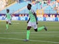 Nigeria's Kenneth Omeruo celebrates scoring against Guinea on June 26, 2019