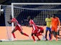 Kenya's Michael Olunga celebrates scoring against Tanzania at the 2019 Africa Cup of Nations on June 27, 2019