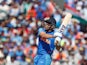 India's MS Dhoni hits a six against West Indies on June 27, 2019