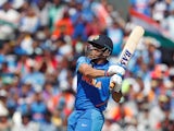 India's MS Dhoni hits a six against West Indies on June 27, 2019