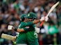 Pakistan's Babar Azam and Sarfaraz Ahmed celebrate after winning the match against New Zealand on June 26, 2019
