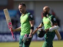South Africa's Faf du Plessis and Hashim Amla walk off after winning the match against Sri Lanka on June 28, 2019