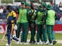 South Africa's Kagiso Rabada celebrates taking the wicket of Sri Lanka's Dimuth Karunaratne with team mates on June 28, 2019