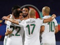 Algeria's Riyad Mahrez celebrates scoring their second goal with teammates on July 7, 2019