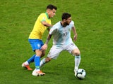 Argentina's Lionel Messi in action with Brazil's Philippe Coutinho during the Copa America semi-final on July 2, 2019