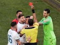 Chile's Gary Medel and Argentina's Lionel Messi are shown a red card by referee Mario Diaz de Vivar on July 6, 2019