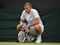 Britain's Dan Evans reacts during his third round match against Portugal's Joao Sousa on July 7, 2019