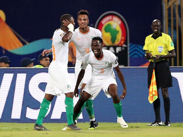  Ivory Coast's Serey Die celebrates scoring their second goal with Jean-Philippe Gbamin and Wonlo Coulibaly on July 1, 2019
