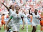 Megan Rapinoe of the U.S. celebrates with team mates after scoring their first goal on July 7, 2019