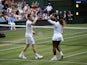 Britain's Andy Murray celebrates winning his first round mixed doubles match with Serena Williams of the U.S. against Chile's Alexa Guarachi and Germany's Andreas Mies on July 6, 2019