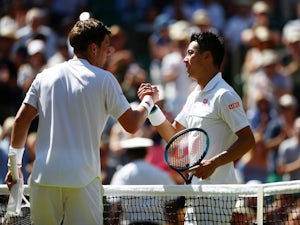 Kei Nishikori eases to victory over Cameron Norrie on Centre Court