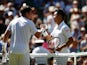 Cameron Norrie and Kei Nishikori shake hands after their clash at Wimbledon on July 4, 2019