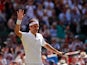 Switzerland's Roger Federer celebrates after winning his second round match against Britain's Jay Clarke on July 4, 2019