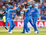 India's Jasprit Bumrah celebrates taking the wicket of New Zealand's Martin Guptill on July 9, 2019