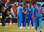 India's Yuzvendra Chahal celebrates taking the wicket of New Zealand's Kane Williamson with teammates on July 9, 2019