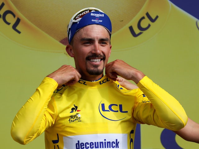Julian Alaphilippe wins stage three to claim yellow jersey