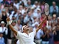 Switzerland's Roger Federer celebrates after winning his semi-final match against Spain's Rafael Nadal on July 12, 2019