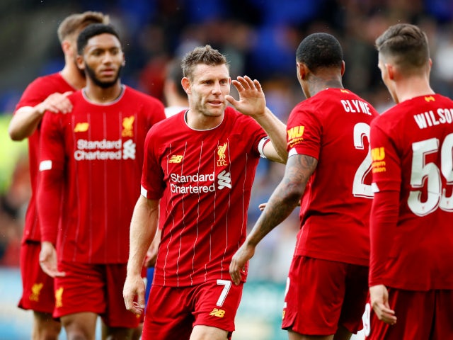 Nathaniel Clyne celebrates with his teammates after giving Liverpool a quick lead against Tranmere Rovers in their pre-season friendly on July 11, 2019