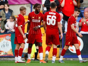 Divock Origi is congratulated after scoring Liverpool's fifth goal in the pre-season friendly with Tranmere Rovers on July 11, 2019