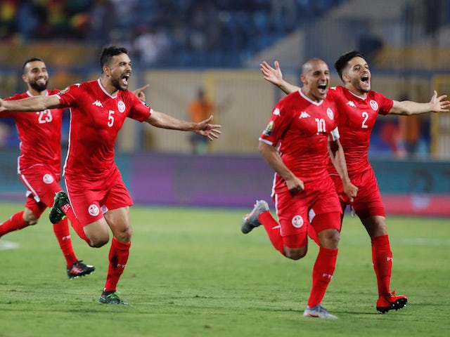 Tunisia players celebrate after winning the match against Ghana on July 8, 2019