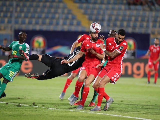Tunisia's Dylan Bronn scores an own goal and the first for Senegal on July 14, 2019