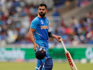 Virat Kohli: 'Top-order collapse cost India place in World Cup final'