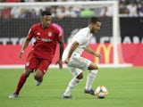 Real Madrid's Eden Hazard in action with Bayern Munich's Corentin Tolisso in the International Champions Cup on July 20, 2019