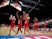 England's Eboni Usoro-Brown and Helen Housby celebrate with teammates after the match on July 21, 2019