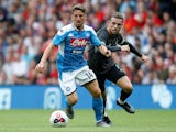 Napoli attacker Dries Mertens in action with Liverpool's Jordan Henderson in pre-season on July 28, 2019